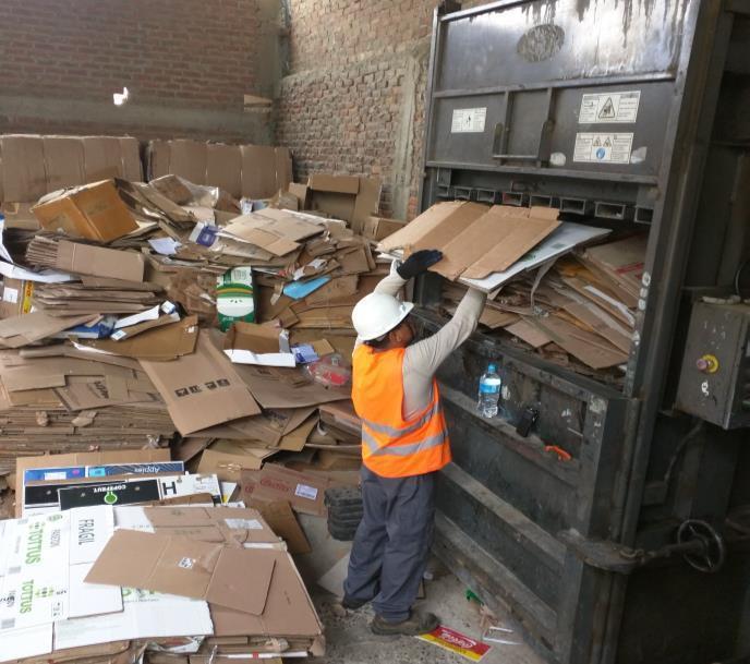 The material for recycling is packaged or pressed to later be sold.